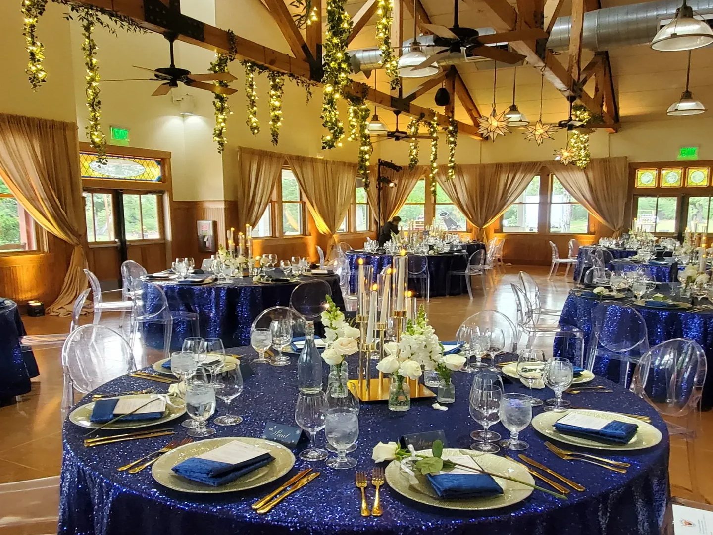 Corporate dinner tablescape with floral centerpieces at Lost Pines, Austin